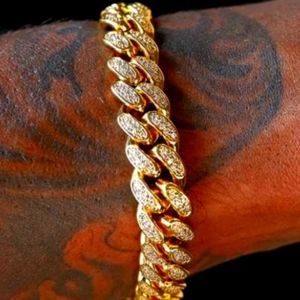 Gold braclet with silver diamonds new in box